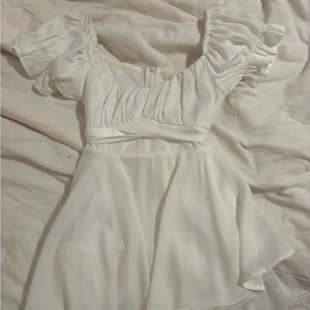 Francesca’s white flowy romper